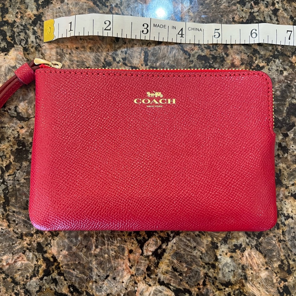 Adorable red Coach wristlet